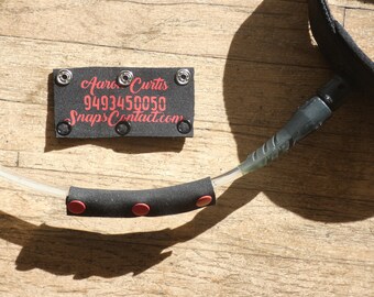 The Sneash. It snaps onto your leash!
