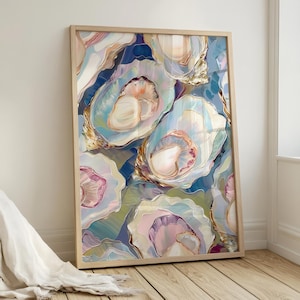 May include: A framed art print featuring an abstract depiction of oysters. The artwork showcases a palette of blues, pinks, and gold, with the oyster shells rendered in a semi-realistic style. The wooden frame adds a natural touch to the coastal-themed art.