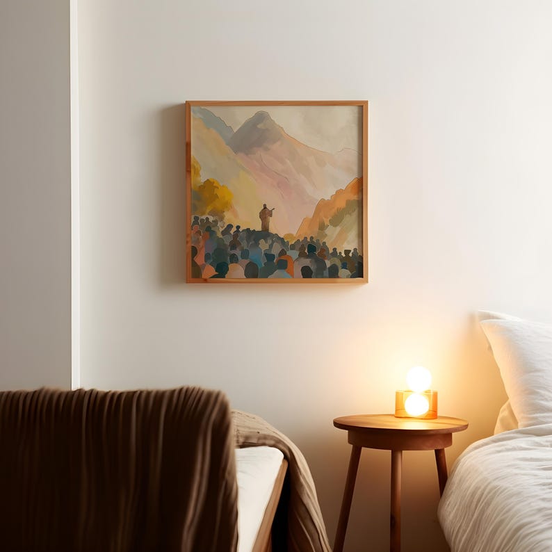 May include: A framed watercolour painting shows a figure speaking to a crowd with mountains in the background. The artwork uses a warm colour palette with orange, pink, and blue tones. The wooden frame provides a natural element to the art piece.