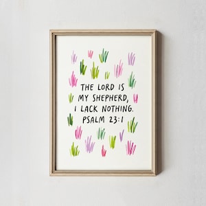 May include: Framed art print with the text "THE LORD IS MY SHEPHERD, I LACK NOTHING. PSALM 23:1" in black. The artwork features colorful brushstrokes of green, pink, and purple, resembling blades of grass, against a white background.