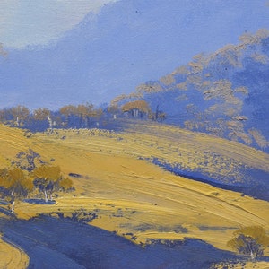 May include: A painting of a landscape with rolling hills and trees. The hills are painted in shades of yellow and brown, while the trees are painted in shades of blue and green. The sky is a light blue color.