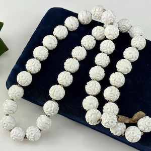 Vintage Monet Shanji Necklace - Faux Carved Lucite & Gold Tone Beads