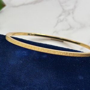 Vintage Monet Thin Stacking Bangle Bracelet - Textured Gold Tone