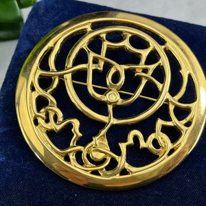 Spilla con nodo celtico in oro - Gioielli vintage Mary McFadden