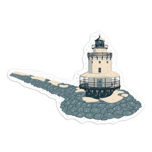 May include: A sticker featuring a lighthouse on a stone pier during a snowfall. The lighthouse is white with a black top and a wraparound balcony. The pier is made of gray stones, with snow covering parts of it.