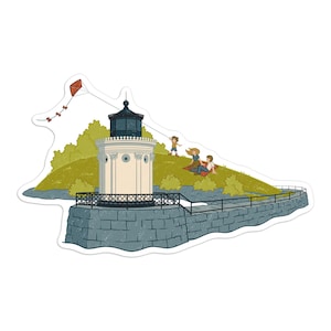 May include: A sticker featuring a lighthouse with a black top and white body, set on a stone wall. A red kite flies in the sky, and people are enjoying a picnic on a grassy hill. The scene is a charming illustration.