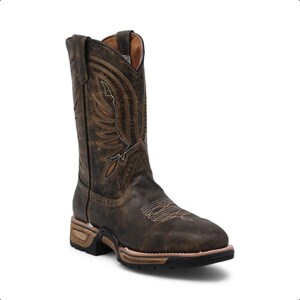 May include: A dark brown leather western boot featuring a distressed finish, a square toe, and intricate white stitching patterns on the shaft and vamp. The boot includes a stacked heel and a black rubber outsole with tan accent detailing.