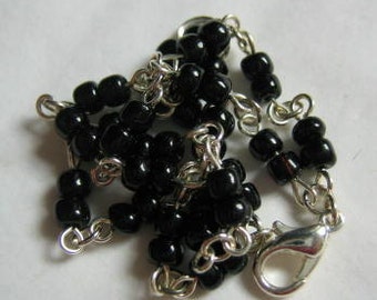 Double brin de perles argent et Bracelet noir