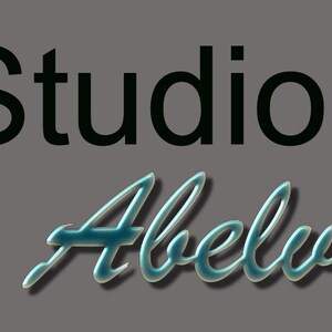 May include: Studio Abelva logo with the word "Studio" in black text and "Abelva" in a blue and white cursive font.