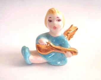 Vintage Holland Mold Sitting Angel Playing Mandolin