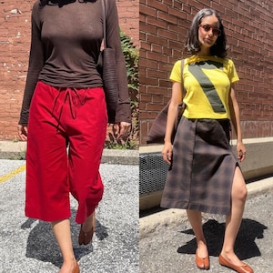 May include: A long-sleeve dark brown top paired with bright red drawstring cropped trousers, and a yellow short-sleeve t-shirt featuring a large dark green number seven, worn with a dark brown plaid skirt that has a side slit, both with brown shoes.