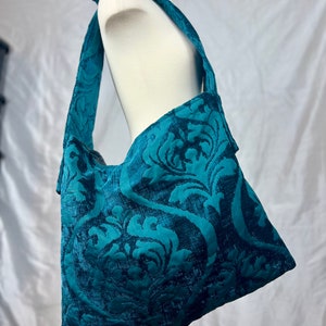 Bolso brocado verde azulado