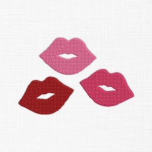 May include: Three embroidered lips in a triangle shape. The top lip is pink, the left lip is red, and the right lip is a darker shade of pink.