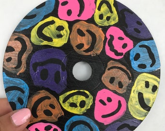 Met de hand geschilderde smiley-cd