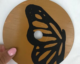 Met de hand beschilderde vlinder-cd
