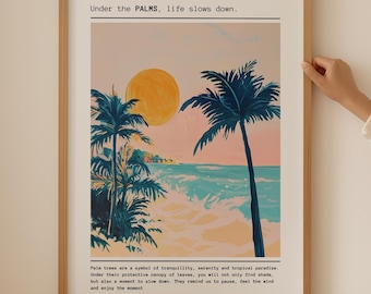 May include: A framed print with a tropical beach scene featuring palm trees, a sunset, and ocean waves. The text "Under the PALMS, life slows down." is at the top of the print. The text below the image reads: "Palm trees are a symbol of tranquility, serenity and tropical paradise. Under their protective canopy of leaves, you will not only find shade, but also a moment to slow down. They remind us to pause, feel the wind and enjoy the moment."