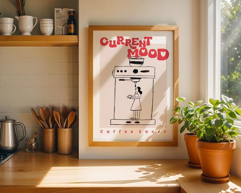 a picture of a kitchen with a picture of a woman cooking