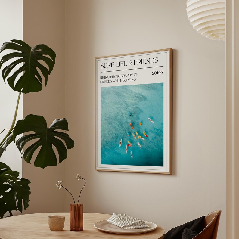 a picture hanging on the wall of a dining room