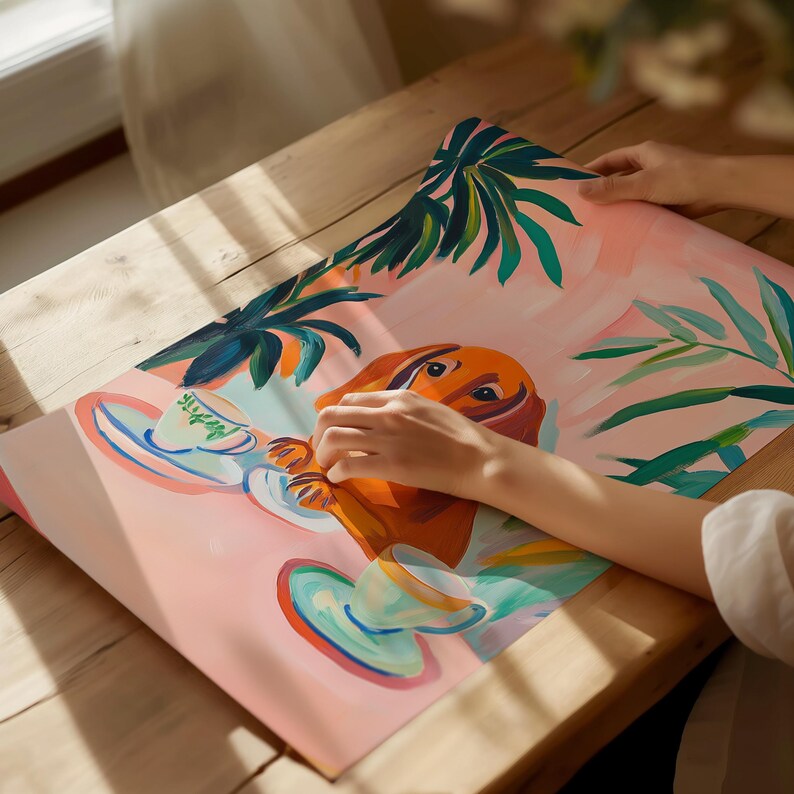 a person is painting a picture on a table