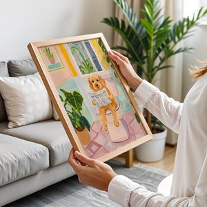 a woman holding a picture of a dog in a living room