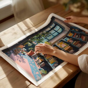 a person is painting a picture on a table