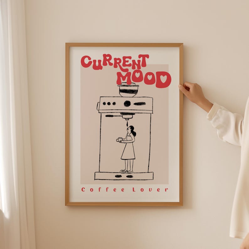a woman standing next to a coffee portafilter poster on a wall