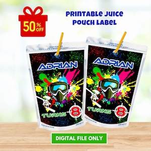 May include: Printable juice pouch label with a paintball theme. The label features a black background with colorful paint splatters, a paintball mask, and the text "Adrian Turns 8".