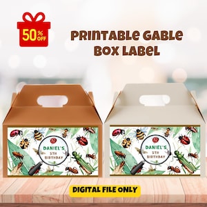 May include: Two gable boxes with insect-themed labels. The labels feature illustrations of ladybugs, bees, and other insects. The text on the label reads "DANIEL'S 5TH BIRTHDAY". The boxes are brown and white with handles. The text "PRINTABLE GABLE BOX LABEL" is at the top.