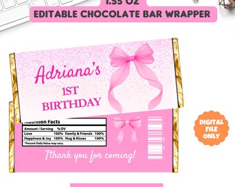 May include: Pink chocolate bar wrapper with the text "Adriana's 1st Birthday" and a pink bow graphic. The wrapper also includes the text "Thank you for coming!" and "Edit in Canva for Free". The wrapper is labeled as 1.55 oz.