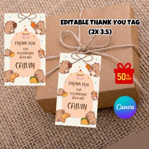 May include: Two rectangular thank you tags with a cartoon wombat theme. The tags read "Thank You for Celebrating with Me!" and "Calvin." The tags are 2 inches by 3.5 inches. A brown gift box is in the background.