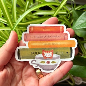 Cozy Book Stack Sticker - Cat in a Teacup Design