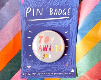 Joy Awaits You badge