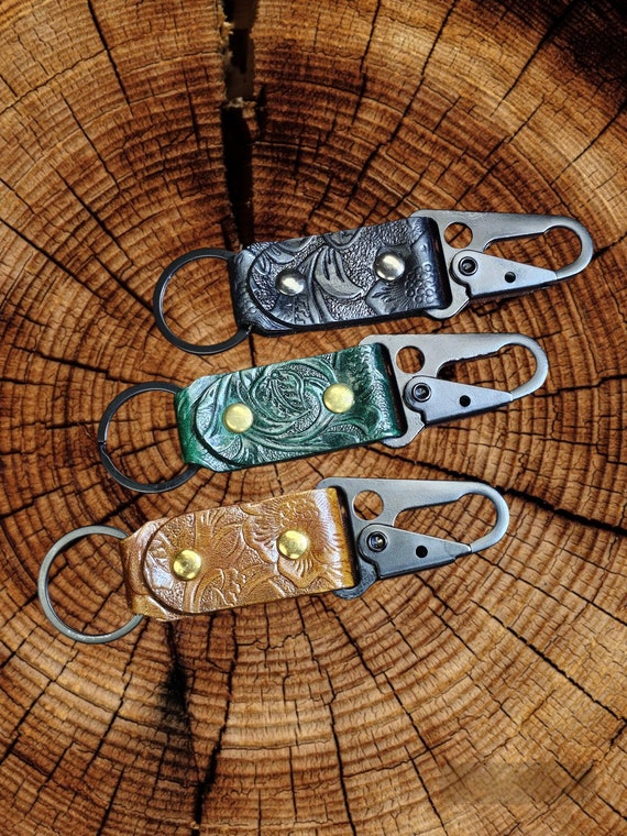Leather handcrafted keychain with embossed full grain veg-tan leather handmade and handcrafted with a 1'' sling lever snap