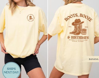 May include: A light yellow t-shirt with a brown graphic on the front and back. The front graphic says "Sierra's 30th Flash Vegas Flight". The back graphic says "Boots, Booze & Birthdays" with a cowboy hat, boots, and a drink.