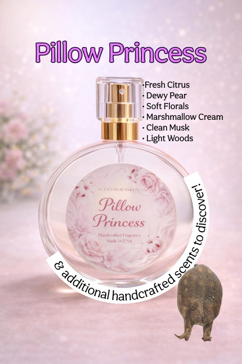 May include: A clear glass perfume bottle with a gold sprayer, labeled "Pillow Princess." The bottle features a floral design and a list of scents: Fresh Citrus, Dewy Pear, Soft Florals, Marshmallow Cream, Clean Musk, and Light Woods. The text "Handcrafted Fragrance Made in USA" is also visible.