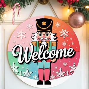 Welcome Nutcracker Christmas Sign | Pastel Holiday Door Hanger | Cute Xmas Wooden Sign | Snowflake Nutcracker Round Wall Decor