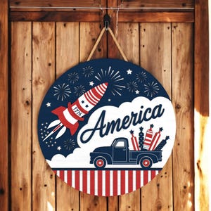 America Firework Truck Sign | Patriotic 4th of July Door Hanger | Red White Blue Rocket Round Sign | Independence Day Porch Decor