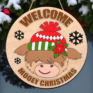 Willkommen Mooey Weihnachten Türschild | Highland Kuh Urlaub Schild mit Wintermütze | Rustikale Bauernhaus Weihnachtswand Dekor | Deko für die Haustür