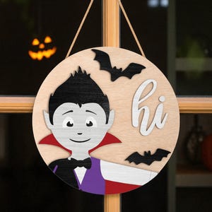 Halloween Door Hanger | Vampire “Hi” Quote Sign with Bats | Wooden Round Cute Dracula Character | Front Door Decor