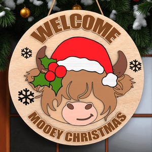 Willkommen Highland Kuh Weihnachten Türschild | Mooey Weihnachtsschild mit Weihnachtsmütze | Rustikale Bauernhaus Urlaub Dekor | Winter Türschild aus Holz