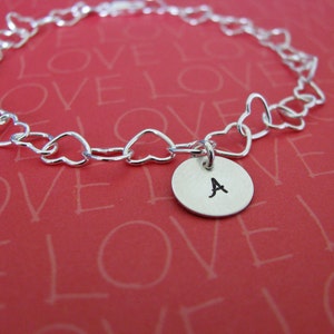heart charm bracelet with personalized initial charms image 1