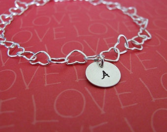 heart charm bracelet with personalized initial charms