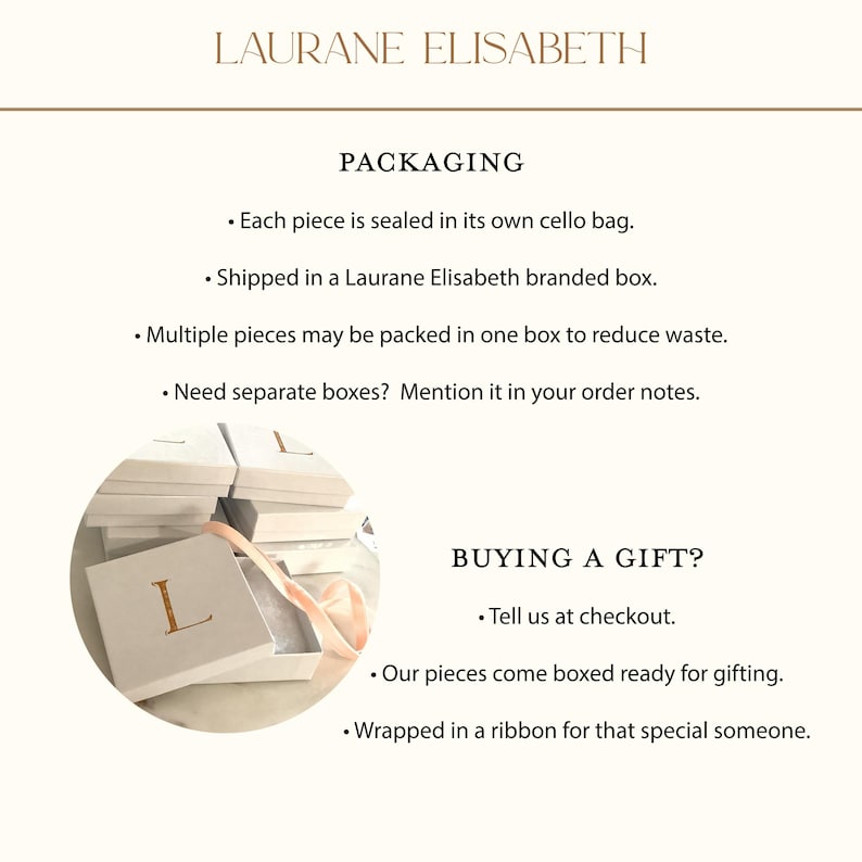 a collection of white gift boxes with a pink ribbon, suggesting they are ready to be packaged and sent as gifts.