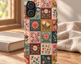 May include: A rectangular smartphone case featuring a grid pattern of various floral illustrations. Each square contains different flowers in shades of pink, red, white, blue, and green against backgrounds of muted tones. The case has a dual camera cutout.