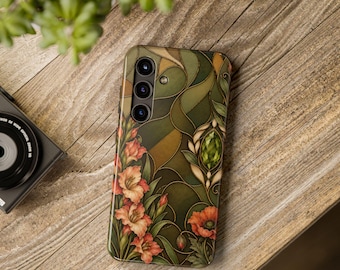May include: A rectangular smartphone case featuring a stained glass-inspired design with flowing dark green lines, orange and pink floral motifs, and a central faceted green gem accent. The case has a vertical triple-lens camera cutout.