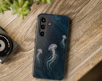 May include: A rectangular smartphone case featuring a dark navy blue background with a printed design of three translucent jellyfish with flowing tentacles. The case has a vertical camera cutout on the upper left side with three lenses.