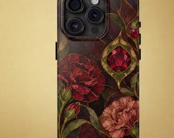 May include: A smartphone case featuring a dark, intricate pattern of deep red carnations and green foliage. The design includes a prominent, faceted red gemstone set within a gold-outlined frame, all set against a dark, moody background.