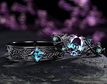 Anillo de boda Art Déco de alejandrita ovalada en oro negro con corte princesa, ideal para hombres y mujeres.