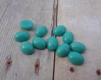 8x6mm Turquoise Opaque Blue Smooth Top Flat Back Oval Glass Cabs 12PCS