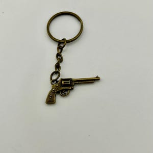 Miniature Bronze Revolver Charm Keychain